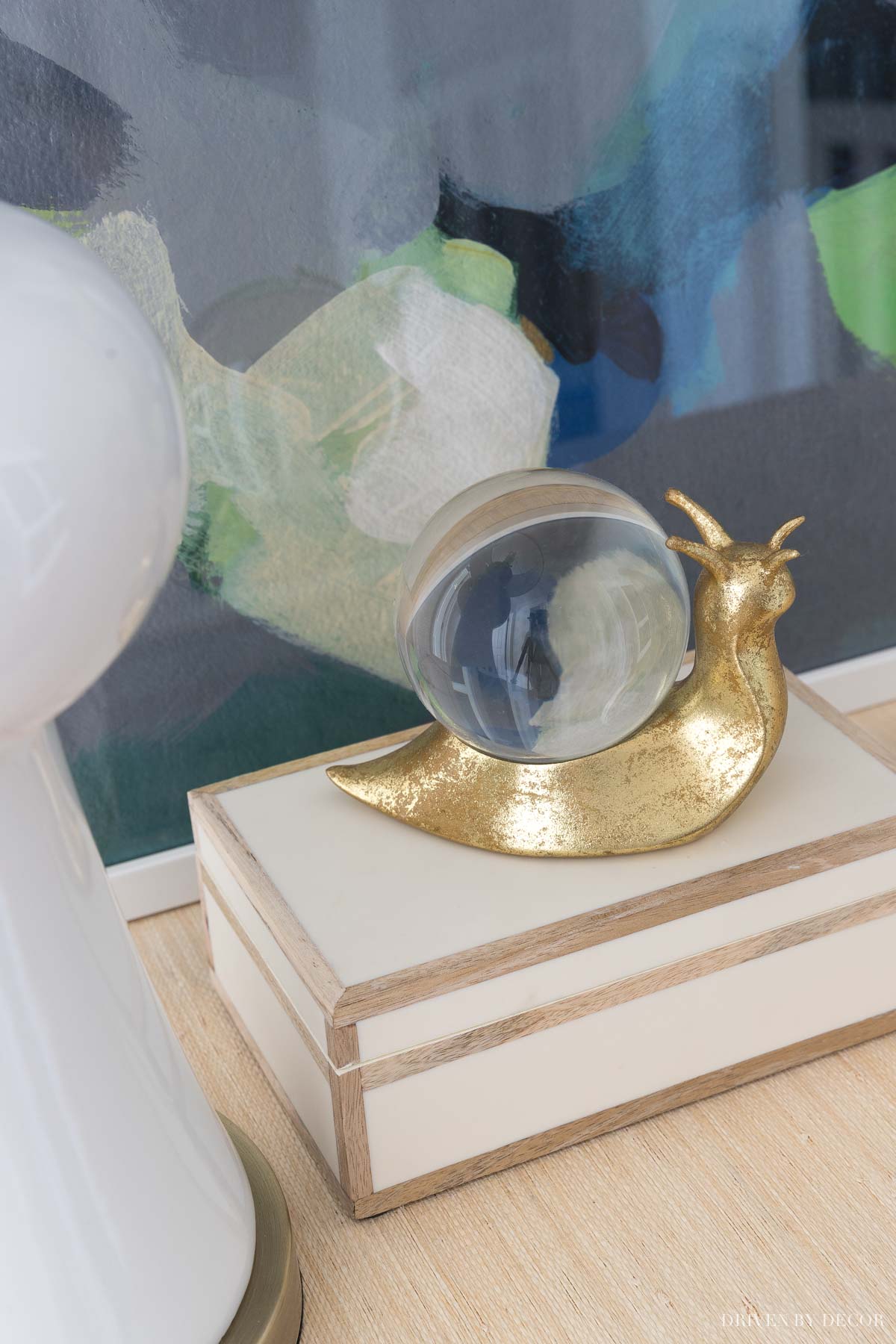 entryway-brass-snail This decorative brass snail on my entryway console is one of my favorite accessories!