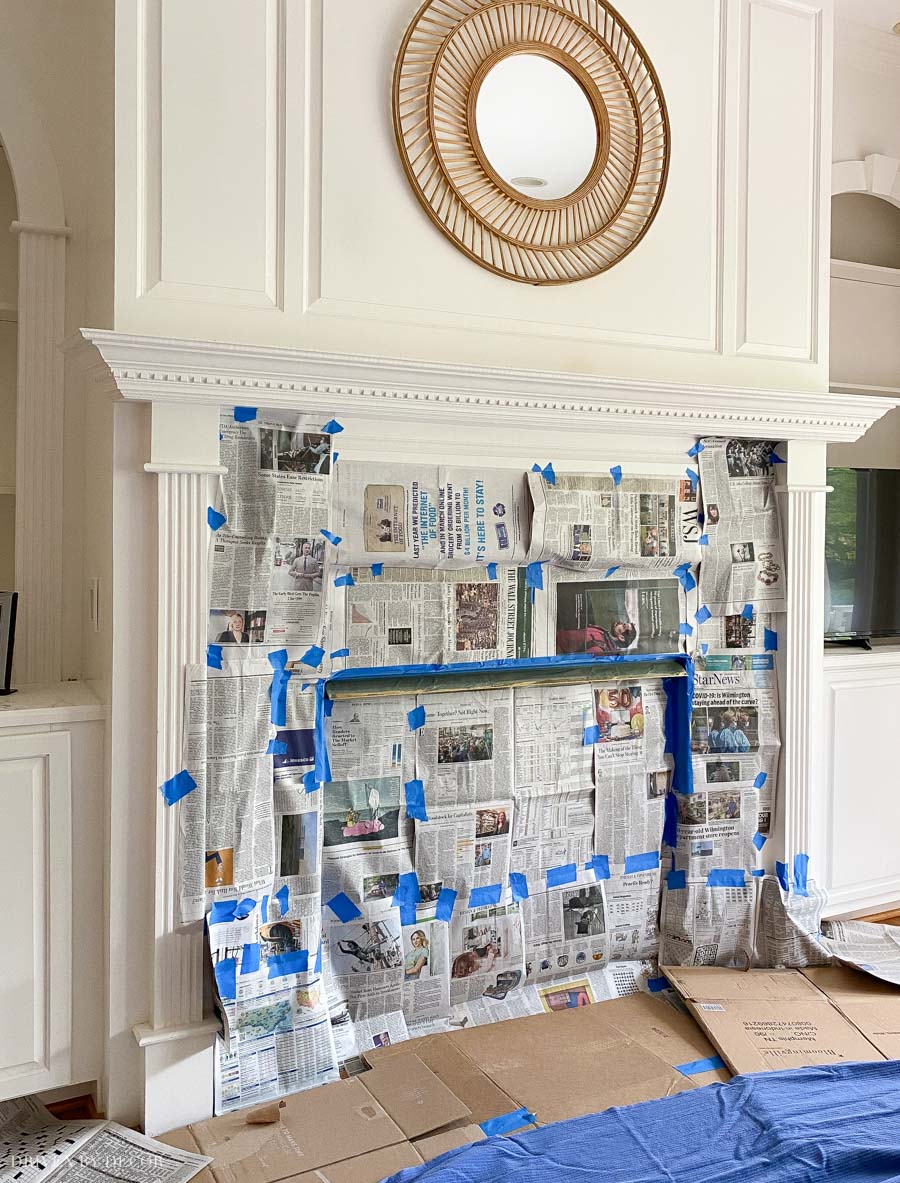 spray-painting-fireplace Prepping our fireplace for spray painting the brass!